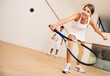 Woman playing squash