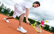 Couple playing tennis