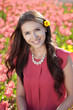 Beautiful young woman with tulips