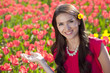 Beautiful young woman with tulips