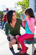 Teacher Comforting Upset Elementary School Pupil