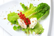 Cheese spread on lettuce leaves