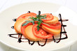 Sliced tomato and smoked cheese