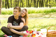 Cute looking boy with pretty girlfriend on picnic
