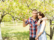 Couple in love posing with the tree