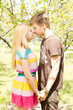 A young couple romancing on a picnic date