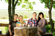 Group of young friends enjoy a drink