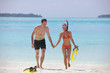 happy young couple have fun on beach