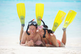 happy young couple have fun on beach
