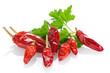 Red chili or chilli pepper and parsley leaves