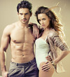 Sexy young couple with serious looking