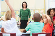 Photo: Teacher Talking To Elementary Pupils In Classroom Teacher Talking To Elementary Pupils In Classroom