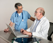 Senior Medical Doctors Discussing Patient's MRI Film Scans