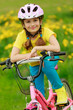 Bike riding - young girl on bike, active child concept