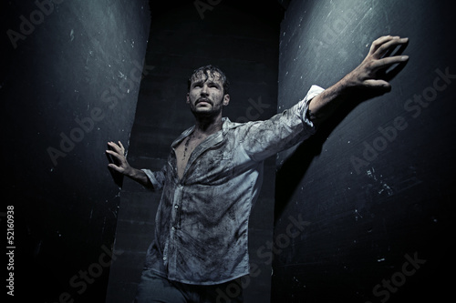 Photo: Dirty man after dirty struggling Dirty man after dirty struggling
