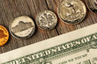 US money over wooden background