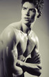 Attractive young athlete with serious look