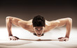 Foto: Muscular handsome guy with curly hair Muscular handsome guy with curly hair