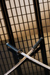 Katana and wakizashi with naked blades on a table
