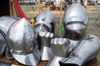 helmets and pieces of medieval armor