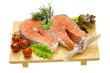 Photo: Raw fresh bright salmon with vegetables Raw fresh bright salmon with vegetables