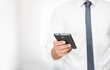 Close up of young man using smart phone