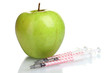 green apple and syringes isolated on white