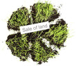 Green grass with ground as concept of land sale isolated
