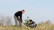 Father and son planting a tree.