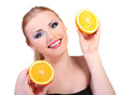 Beautiful young woman with glamour make up and orange, isolated