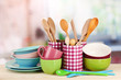 Cups, bowls nd other utensils in metal containers isolated