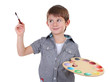 Photo: Cute little boy drawing isolated on white Cute little boy drawing isolated on white