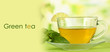 Cup of tea with mint on table on bright background