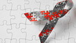 Autism ribbon falling onto jigsaw surface in selective black and white