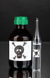 Deadly poison in bottles on black background
