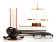 Golden scales of justice, gavel and books isolated on white