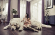 Young woman hugging big dog