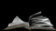 Pages of the bible turning in the wind