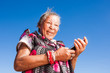 Elderly woman her new cellphone
