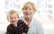 Photo: Smiling young boy and his grandmother Smiling young boy and his grandmother
