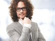 Foto: Portrait of a young businessman who's standing in his office Portrait of a young businessman who's standing in his office