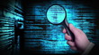Montage of a screen showing binary code and magnifying glass 