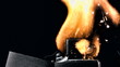 Hand lighting retro lighter close up