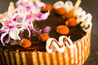 Foto: Tastefully decorated cake with chocolate coating Tastefully decorated cake with chocolate coating