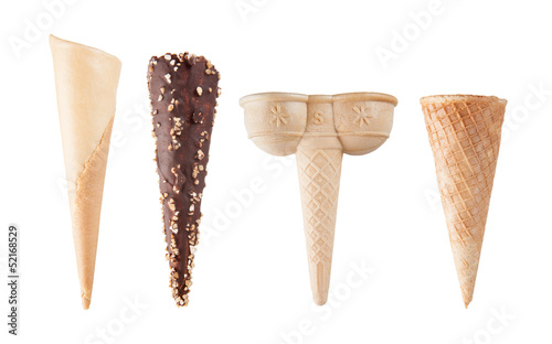 Photo: Four different empty ice-cream cones isolated on white Four different empty ice-cream cones isolated on white