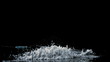 Needle falling on pile of white drug on black background