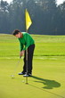 Golf player putting