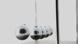 Newtons cradle in motion on white background