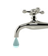 Dripping tap with drop on white background