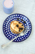 Cheese sweet pancakes and berry yogurt for breakfas